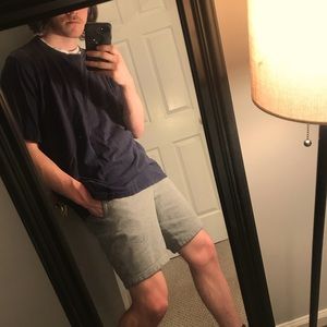 slightly tattered plain blue tee